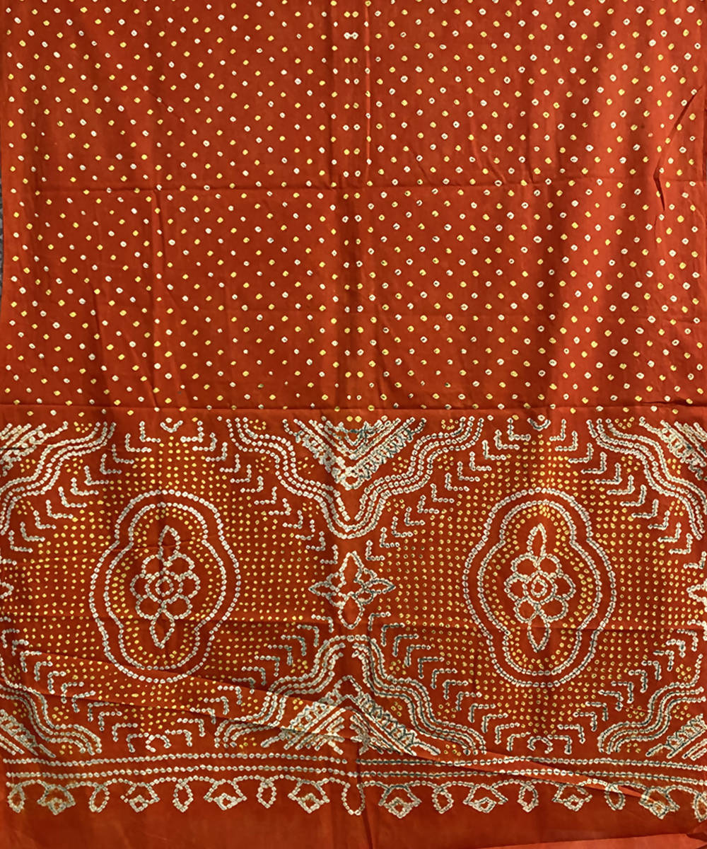 Orange hand printed bandhani cotton silk saree