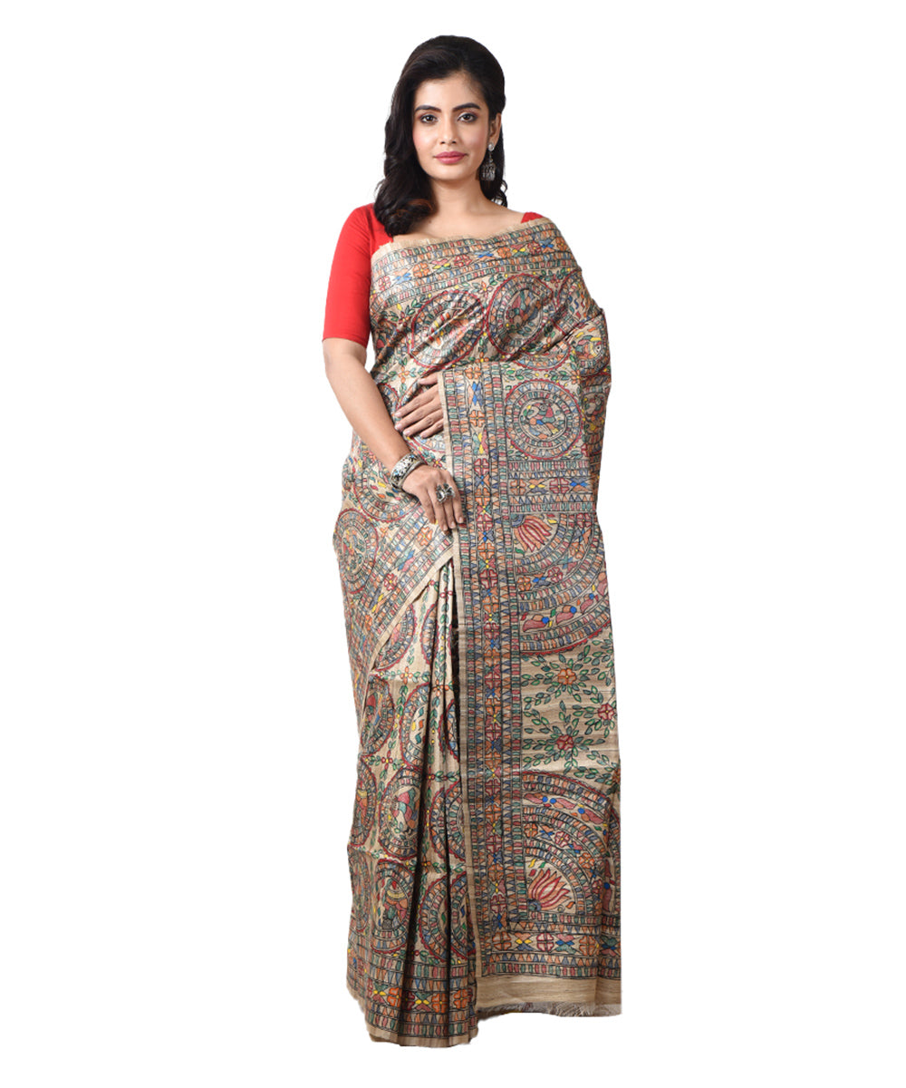 Beige bengal tussar silk multicolour hand painted madhubani saree