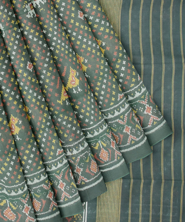 Dark green hand woven cotton patola saree