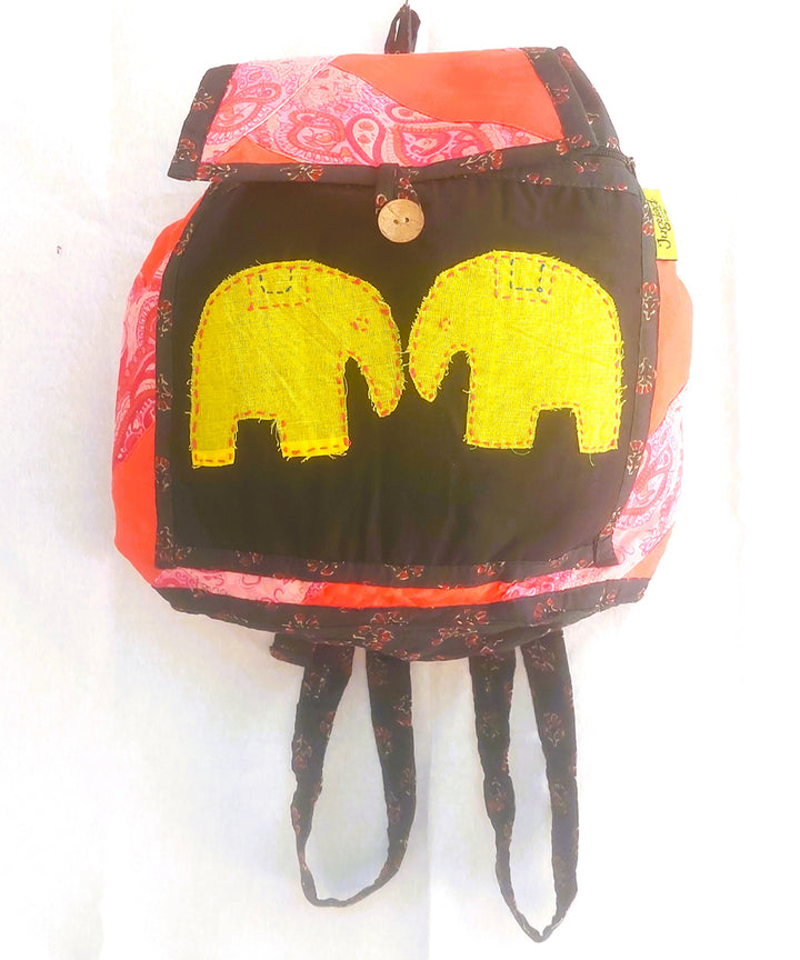 Red and brown handcrafted cotton backpack