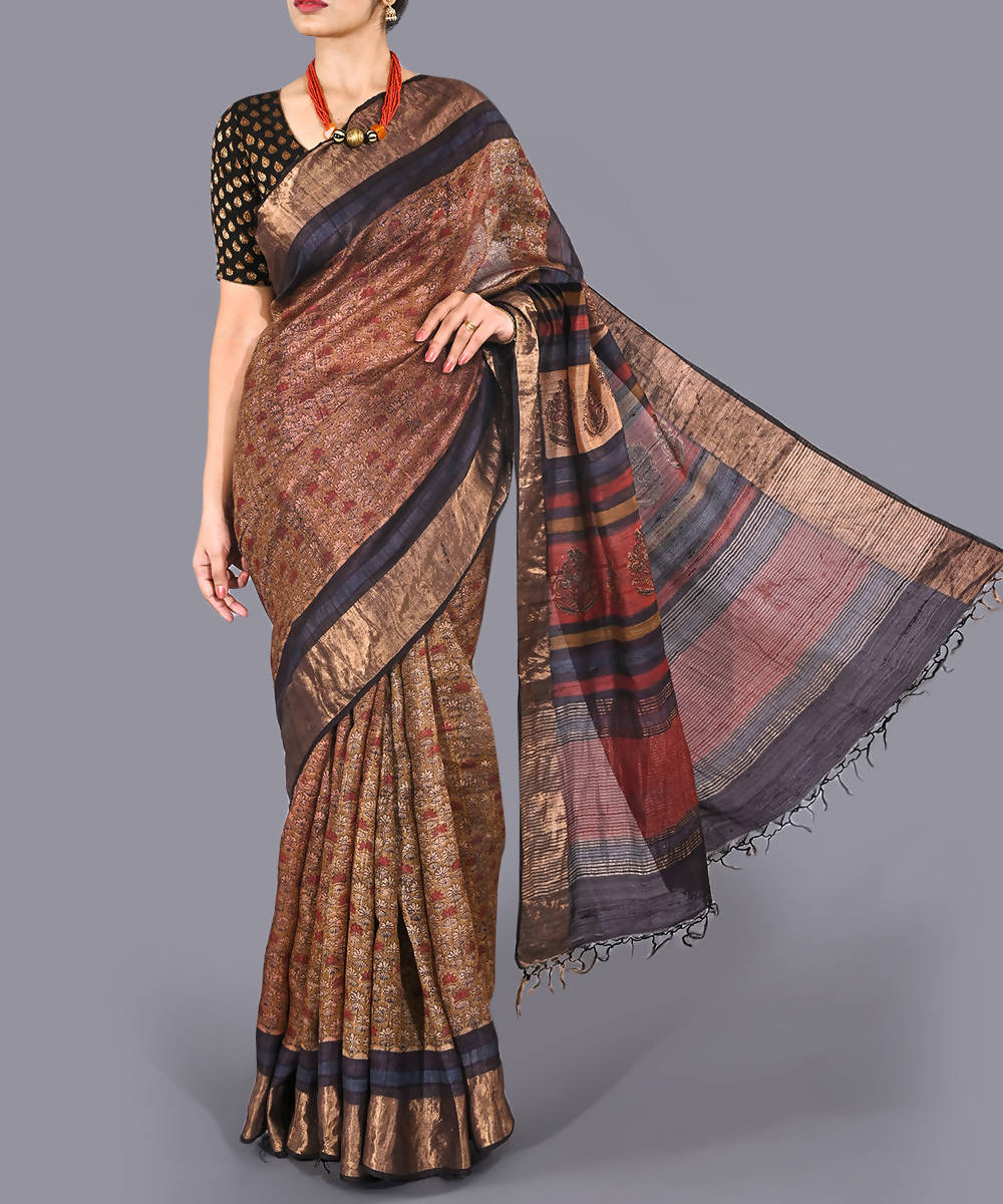 Brown tussar silk hand block printed saree with zari border