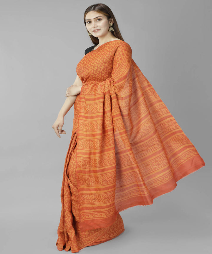 Orange bagru handblock printed tussar silk saree