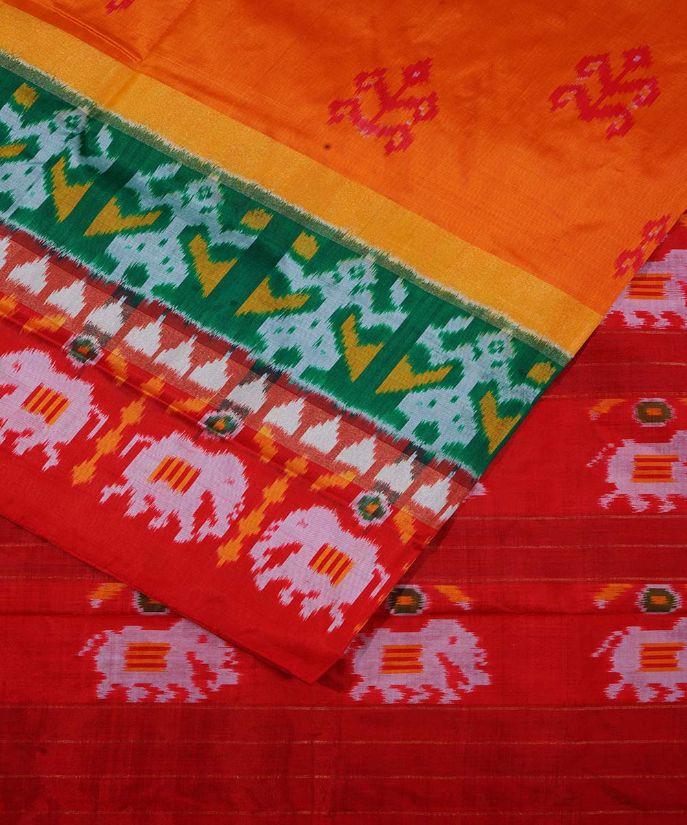 Bright orange handwoven ikkat silk pochampally saree