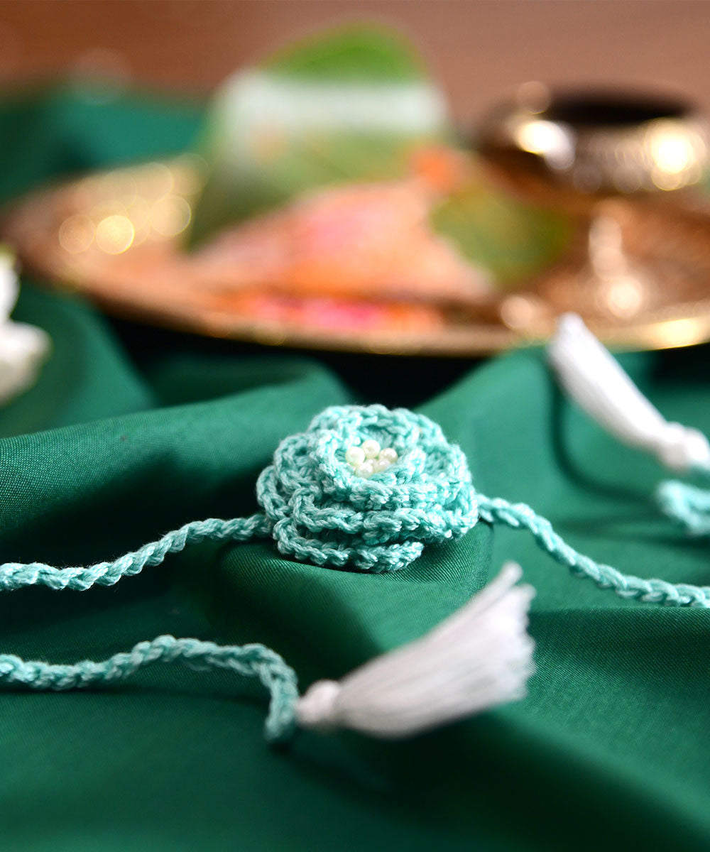 Turquoise blue hand embroidery cotton rakhi