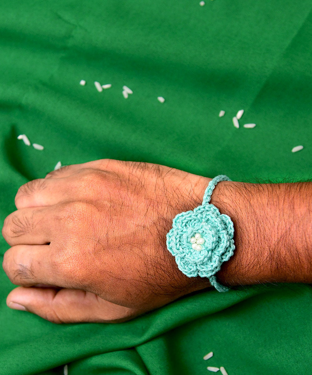 Turquoise blue hand embroidery cotton rakhi