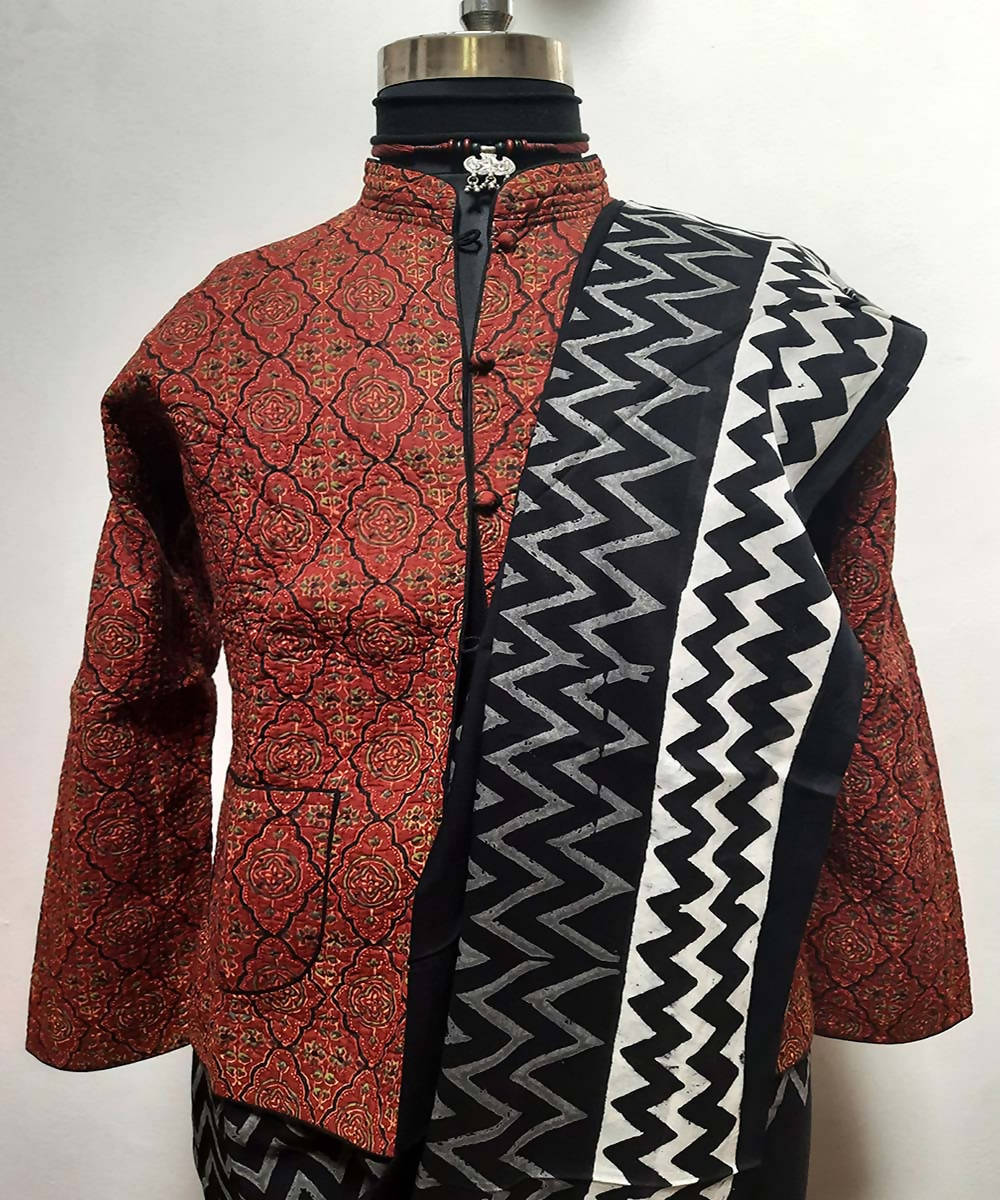 Black and red block printed reversible jacket with cotton quilting