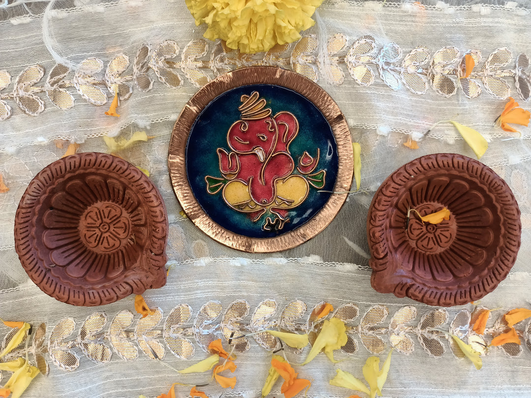 Blue handcrafted ganesh copper plate and terracotta diya set
