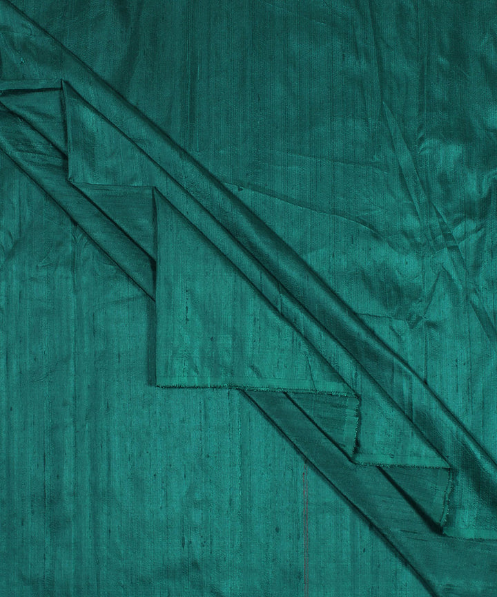 Dual shade dark green handspun handwoven raw silk fabric