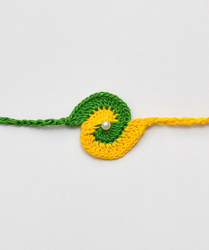 Light green yellow hand embroidery cotton rakhi