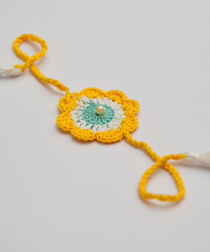Yellow blue hand embroidery cotton rakhi