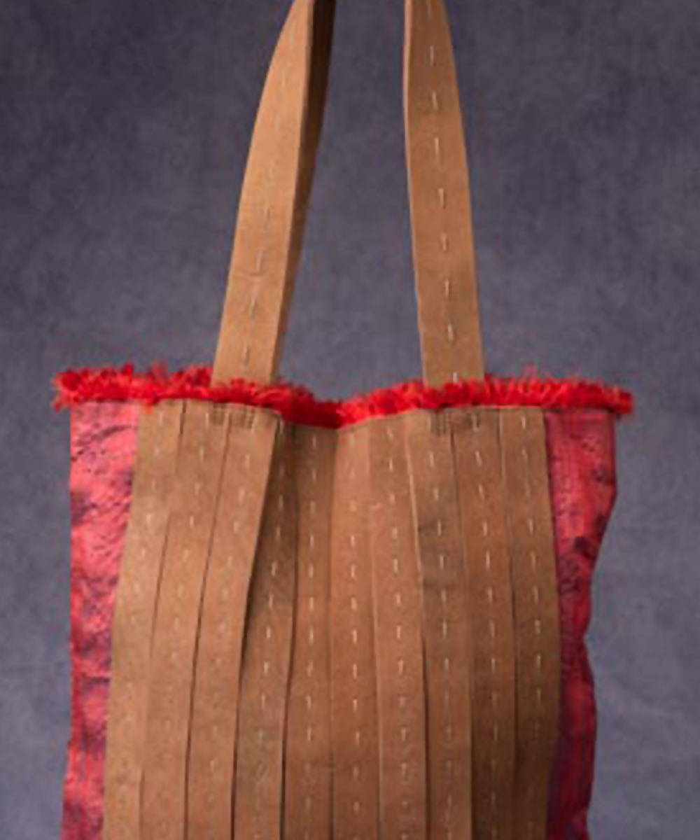 Red brown hand made silk bag with leather button and handle